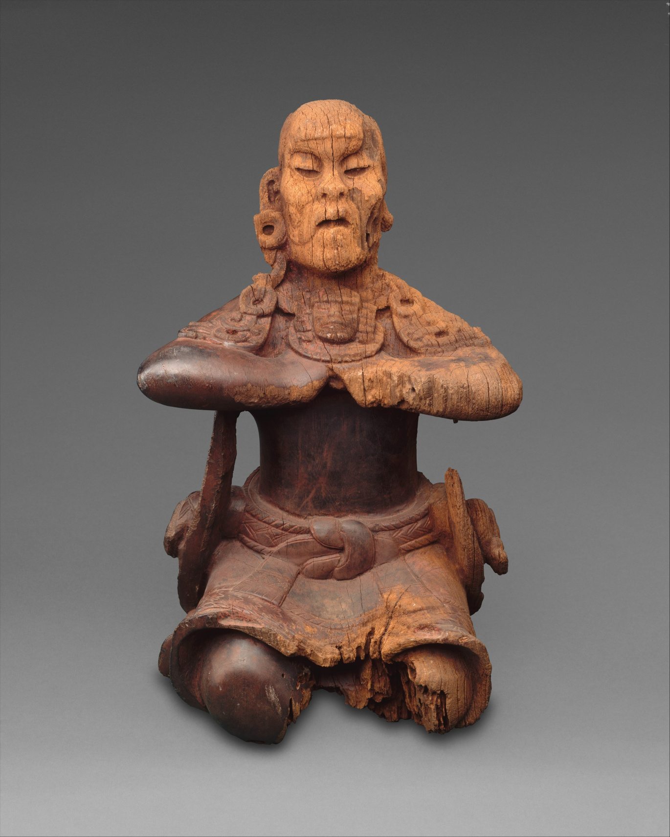 Mirror-BearerDescription	
Maya; Male figure; Wood-Sculpture