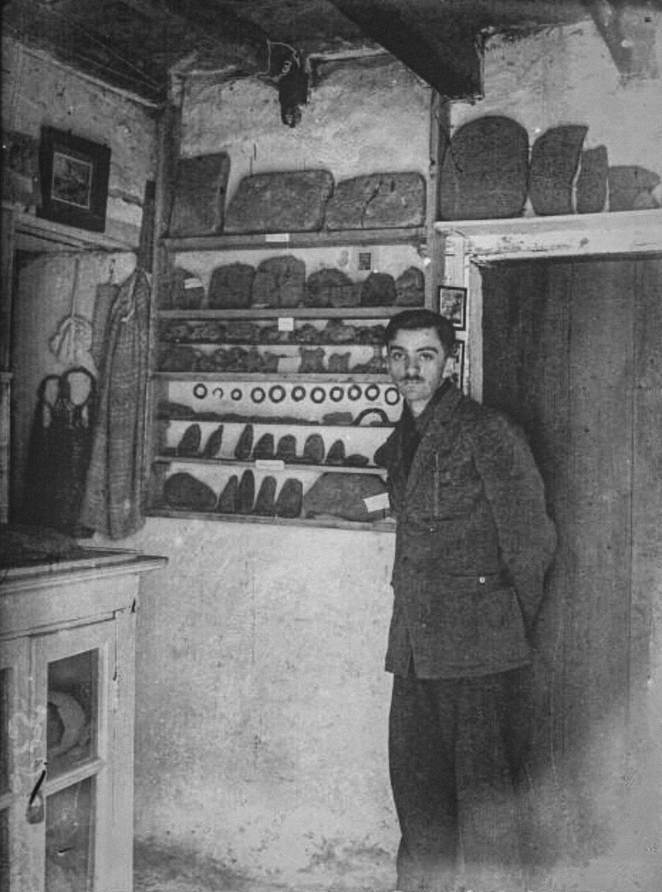 Young Emile Fradin inside his museum at Glozel (Ferrières-sur-Sichon, Allier, France).